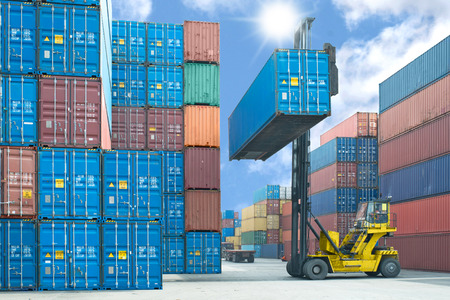 38903134 - forklift handling container box loading to truck in import export logistic zone