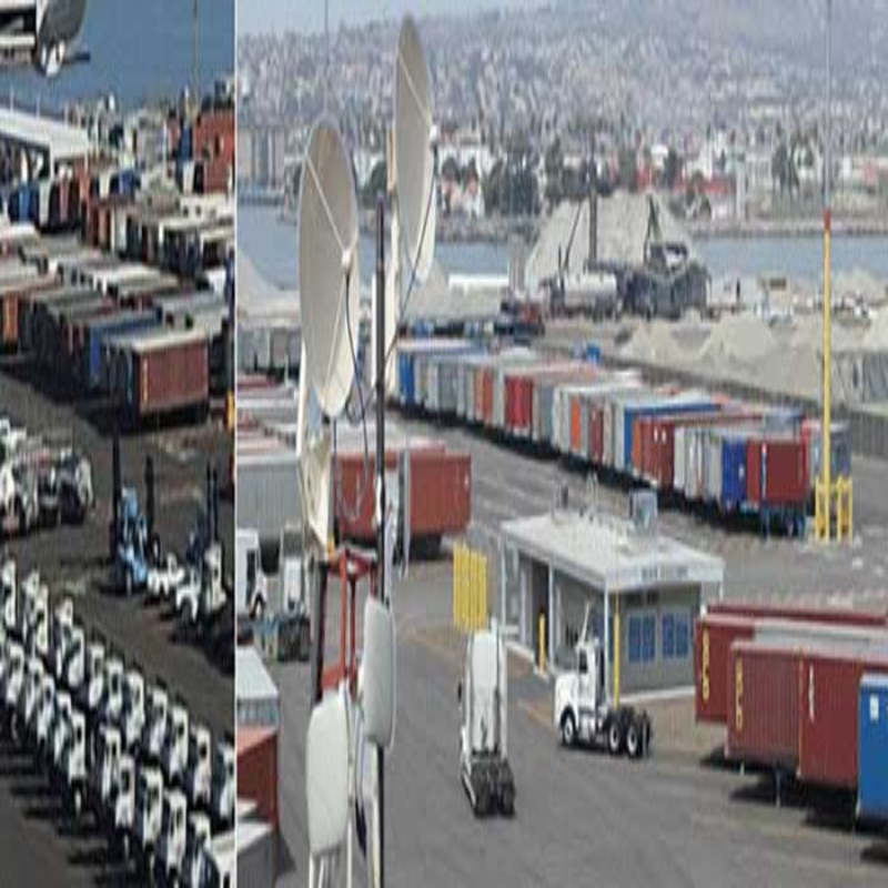 Container yard with tall antenna masts and rows of trailers where radio coverage must be planned