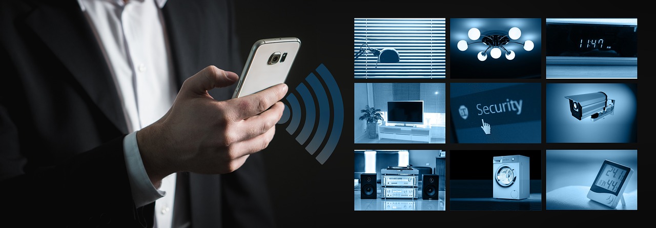 Businessman controlling smart devices with a smartphone